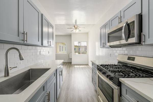 1 Top-Floor 2-Bedroom, 2-Bath Apartment with Parking Included 1