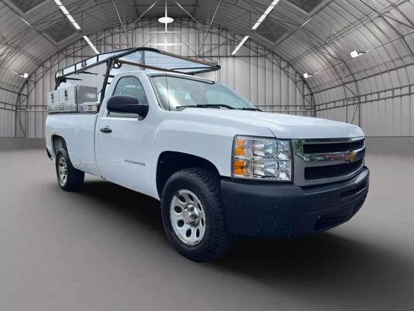 2012 Chevy Silverado CAMA LARGA CON CAJAS Y PORTAEQUIPAJES - $4,950 (riverside)63621970301057121