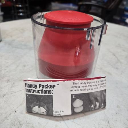 Bearing packer tool.     &***& 1