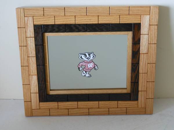 #444 Wisconsin Badger logo on a framed mirror 1