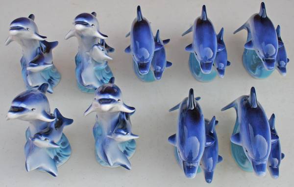 9 Dolphin ceramic figurines 1