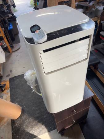 2 A/C units - 1 with remote! 1