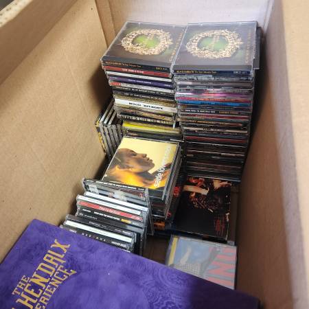 Box of empty cd cases with covers 1