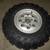 2003 Suzuki Vinson 500 Front 4/110 Rim Wheel 25X8-12 BAD Tire 1 thumbnail