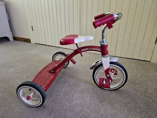 Red Radio Flyer tricycle with push handle 1