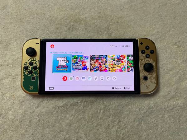 Nintendo Switch OLED with 125 Pooular Switch games - video