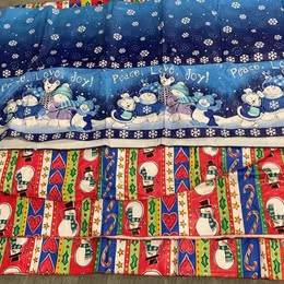 4 flannel backed Christmas tablecloths 1