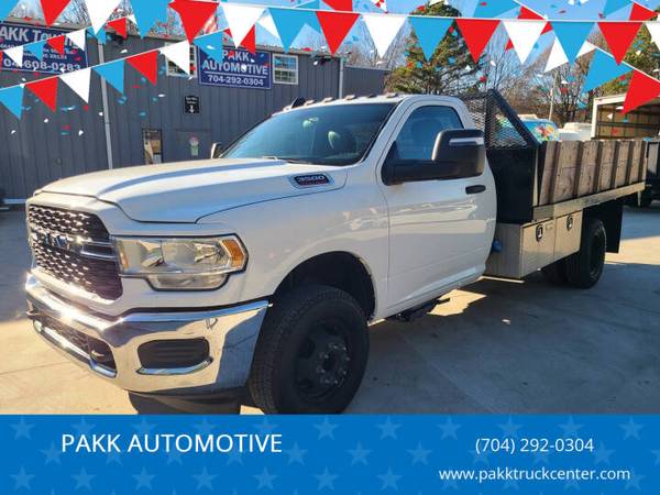 2024 RAM 3500 Reg Cab DRW 4x4 Farm Hauler Work Truck Stake Bed Flatbed 1