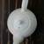 White tea pot with daisy design and a small pitcher. 3 thumbnail