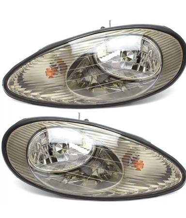 Pair new headlight assemblies Ford Taurus/Mercury Sable 1