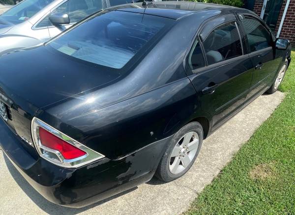 2011 ford fusion - $1,25063621709404417122