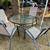 Round patio table and four chairs 1 thumbnail