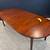 Restored Mid Century Modern walnut expanding oval dining table 8 thumbnail