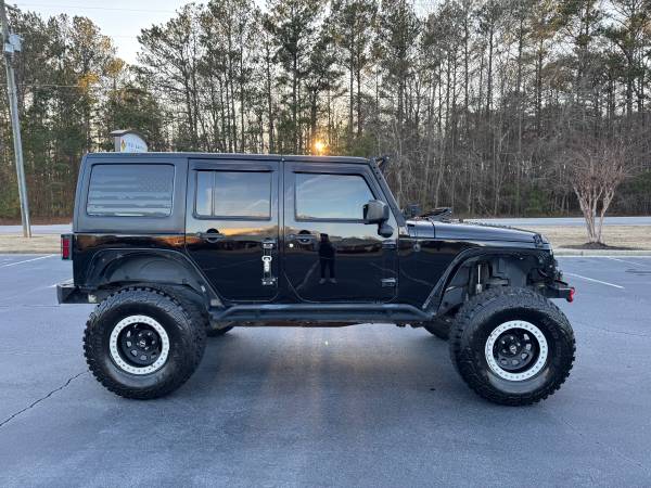 2016 Jeep Wrangler Unlimited Sport 4WD - $16,000 (Loganville)63621080330755121