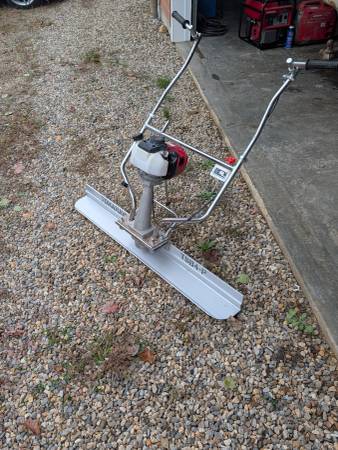 Almost new concrete power screed 1