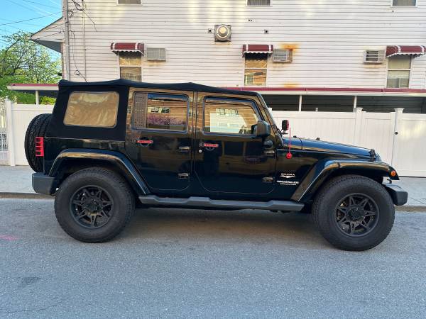 2015 Jeep Wrangler Sahara - $12,90063476989010561122