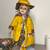 Vintage Porcelain Collectible Doll Wearing a Rain Slicker 1 thumbnail