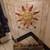 Vintage white metal planter with large sun. 1 thumbnail