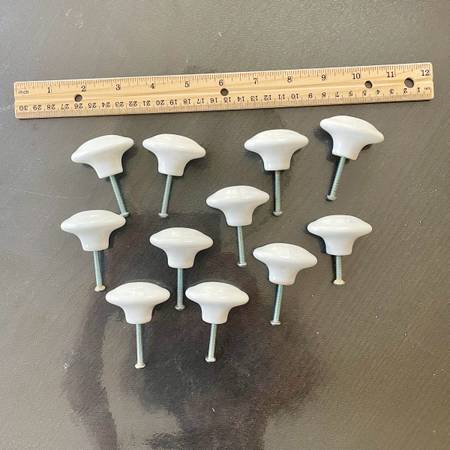 11 white oval drawer pulls, ceramic 1