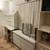 FURNISHED room 3 beds WIFI GYM POOL JACUZZI $1500 or $750 ea shared 14 thumbnail