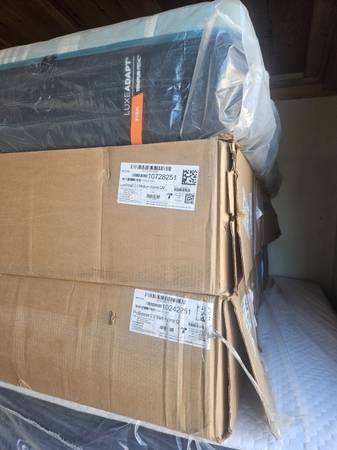 Tempur-Pedic adjustable bed.  Mattress and base  is still in boxes 1