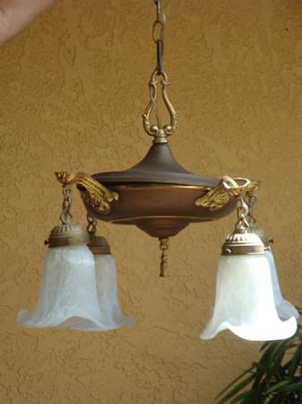 Antique brass lamp with four glass shades 1