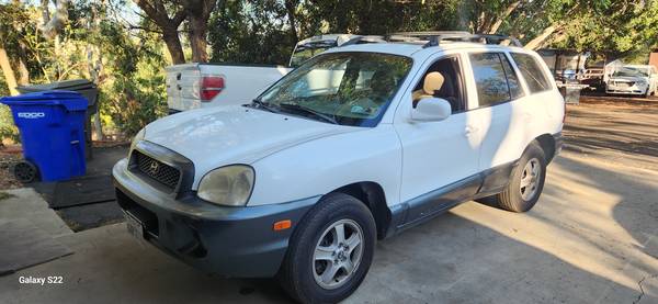 2004 Hyundai Santa Fe V6 automático, todas las funciones eléctricas, techo solar, funciona excelente, 171 mil millas - $1.995 (San Marcos)63440275034115121