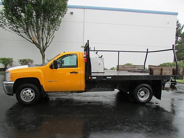 2012 Chevy Silverado 6.6 Diésel, cama plana, 4x4, solo 94 mil millas - $24995.0063472633054595123