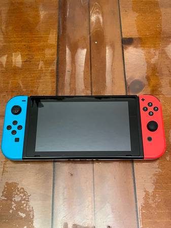 Nintendo switch with case and Nintendo pro controller 1