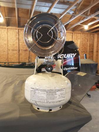 Propane tank (11 gal) with Mr. Heater sunflower head 1