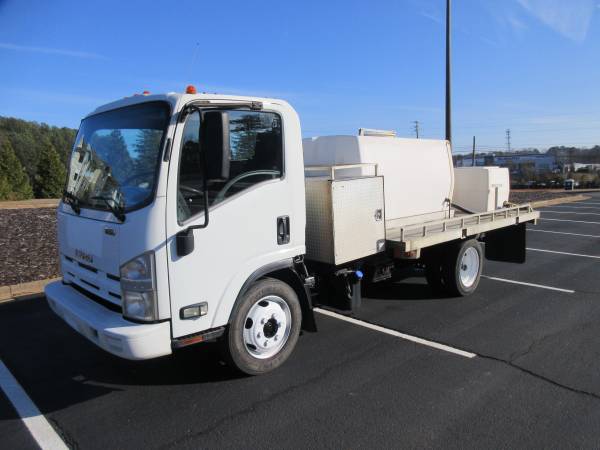 2012 Isuzu NQR Flatbed/Spray equipment