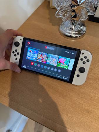 Switch – OLED Model w/Joy-Con + Games + Case (Dad Overbought Edition) 1