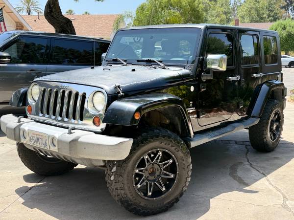 ****** 2010 Jeep Wrangler Sahara Unlimited CARGADO, TÍTULO LIMPIO - $11,500 (Laguna Hills)63470773010563121