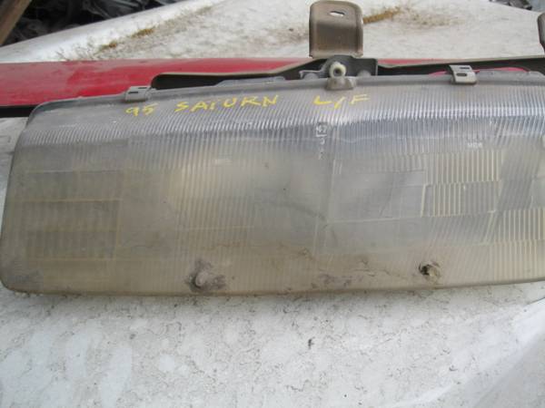 95 Saturn left head lamp 1