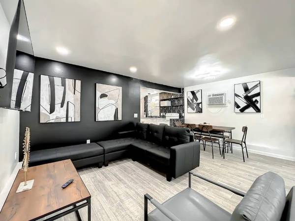 Sleek & Stylish Black and White 2-Bedroom Apartment 1