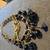 Black beads and gold tone chain 2 thumbnail