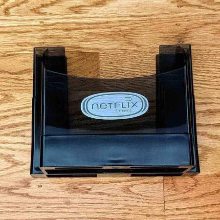 Vintage original Netflix.com Netflix Flixrack 4 DVD movie disk holder 1