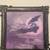 Girl Laying On a Bat Framed photo 1 thumbnail