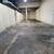 Large building with warehouse/flex spaces, office spaces and parking. 2 thumbnail