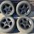 Set of four 15x7 inch aluminum wheels with old tires 4 on 114.3 lugs 1 thumbnail