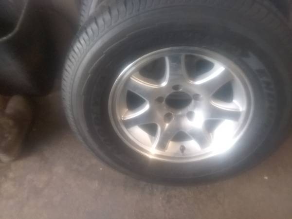 Pair alum trailer wheels/tires 1