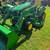 John Deere 1023E with loader and mower 1 thumbnail