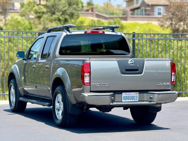 Nissan Frontier 4x4 - $7,999 (Chula Vista)63624789344129124