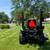 John Deere 1023e compact tractor with a loader and 60 inch deck 3 thumbnail