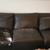 Beat up leather couch 3 thumbnail