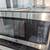 Whirlpool 16 cu ft Refrigerator with Top Freezer and microwave 7 thumbnail