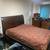 Solid dark wood full-size bed frame with built-in under bed storage 3 thumbnail