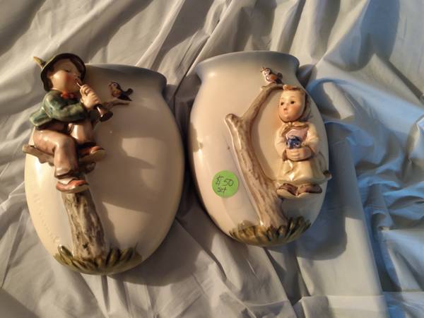 Boy/ girl antique ceramic wall art 1