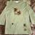 Stylish green mid sleeve top with abstract graphic design. Perfect fo 1 thumbnail