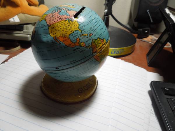 Old metal globe coin bank 1